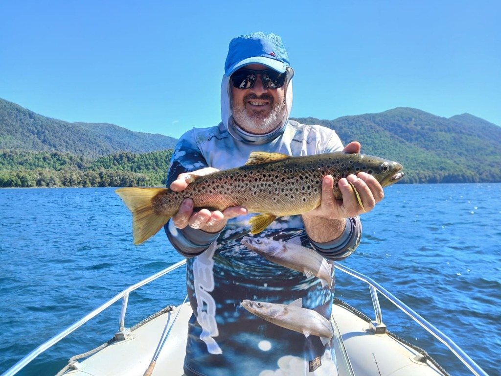 Motorboat fishing in Andean lakes