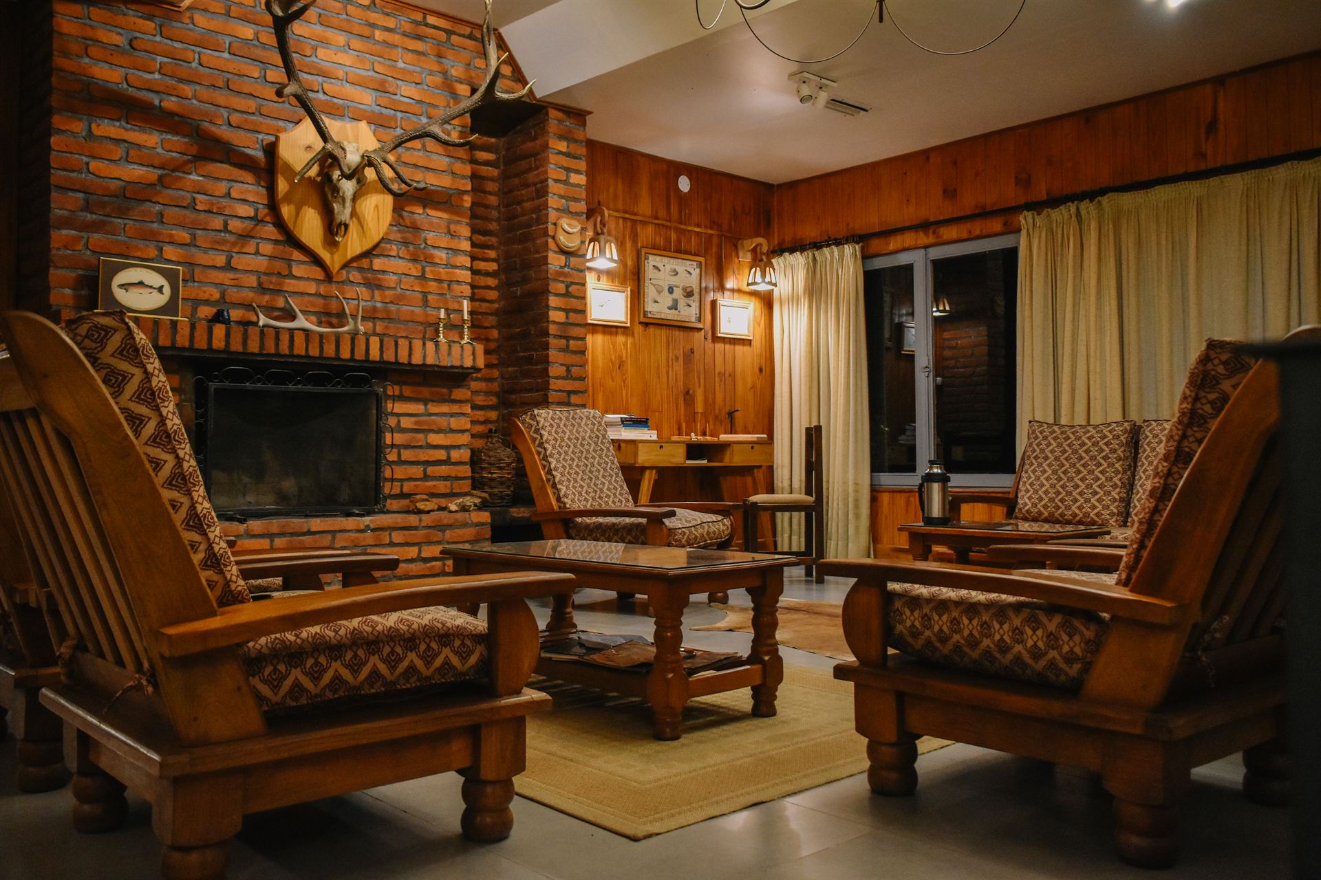 The main lodge living room with fireplace